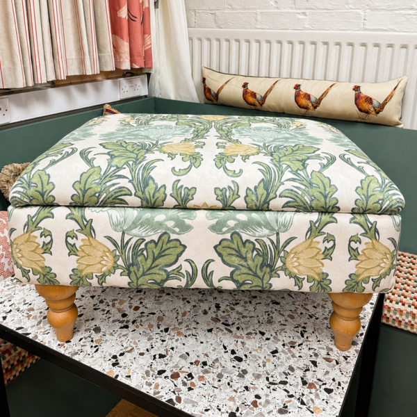 Bespoke upholstered footstool in botanical patterned fabric
