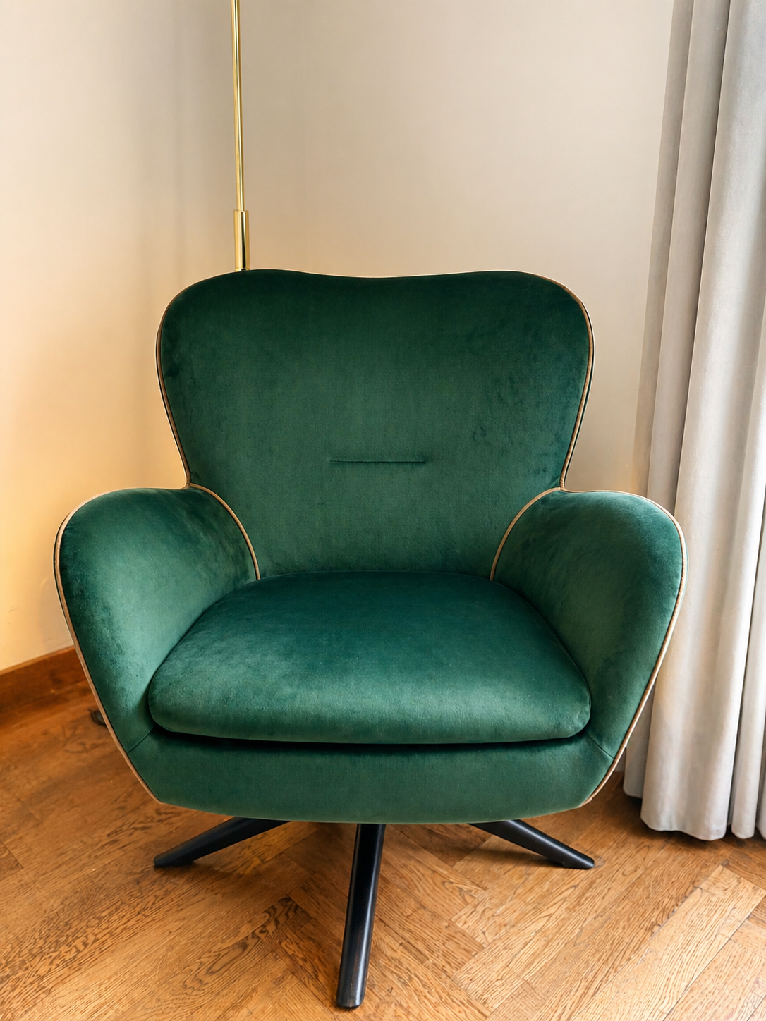 Green velvet chair reupholstered with contrast piping by Creature Comforts Upholstery