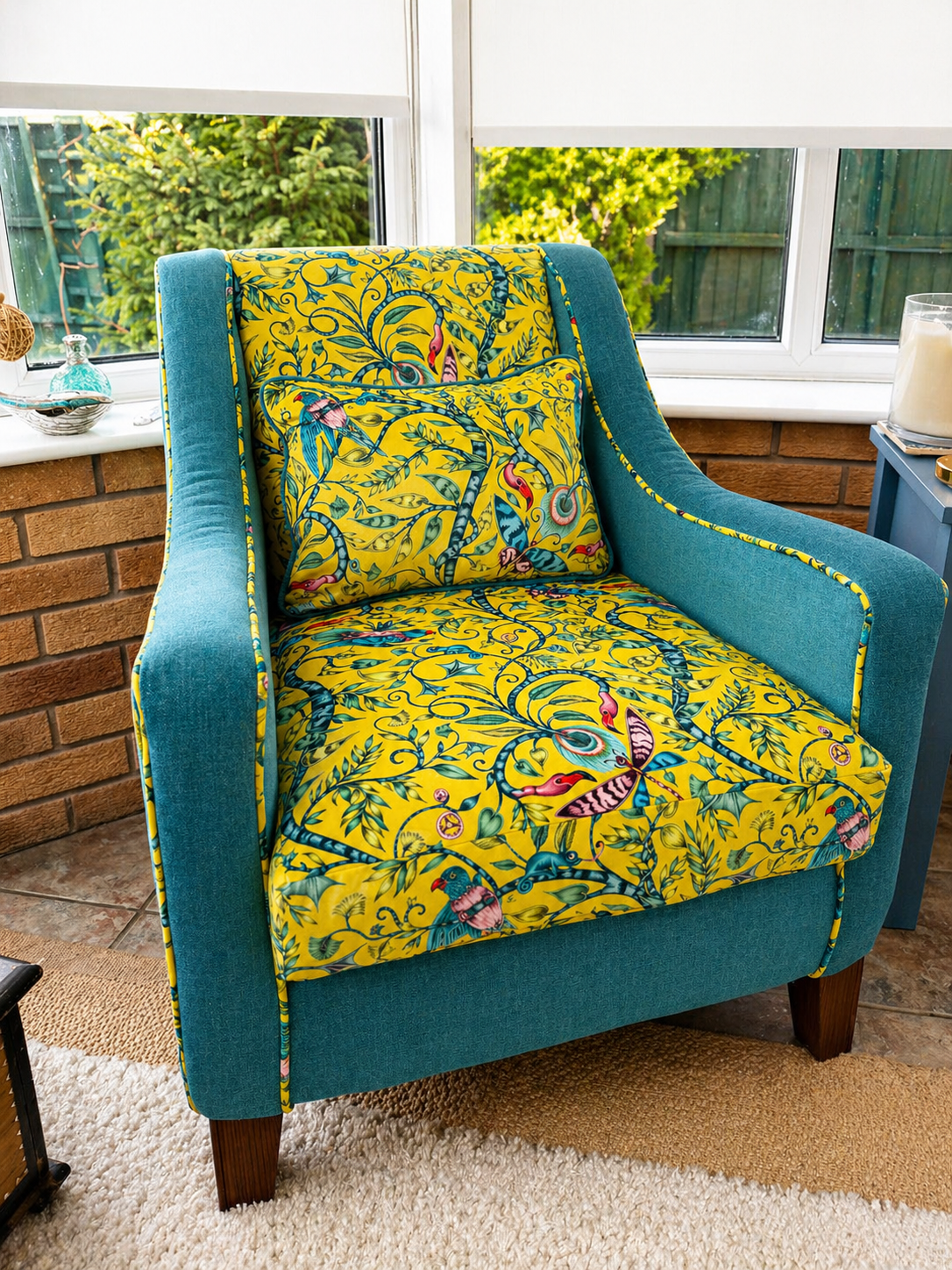 Yellow patterned accent chair reupholstered with a matching cushion